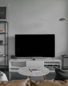 tv in a white living room